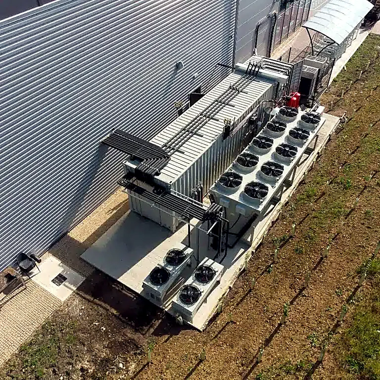 Rooftop CO2 refrigeration gas coolers serving a commercial facility