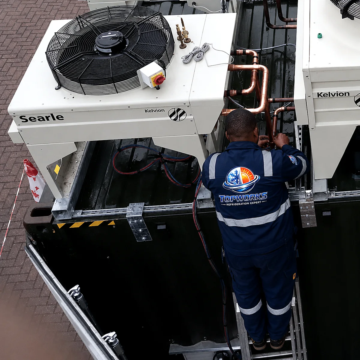 Topworks technician servicing commercial CO2 refrigeration equipment